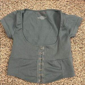 Stylish Green Top with Hook Detailing